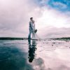 5 reasons tiny weddings rock beach-bride-clouds