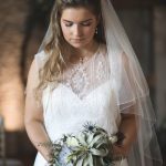 Bride looking down in front of moongate | Journey to the Centre of the Earth | modern ethereal winter styled bridal shoot by Hanami Dream | agate | marble | airplants | tulle | pale blue | gold | Oxleaze Barn | Gloucestershire | October 2017 | Photography by Squib Photography www.squibphotography.co.uk