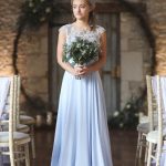 Bridesmaid in front of moongate | Journey to the Centre of the Earth | modern ethereal winter styled bridal shoot by Hanami Dream | agate | marble | airplants | tulle | pale blue | gold | Oxleaze Barn | Gloucestershire | October 2017 | Photography by Squib Photography www.squibphotography.co.uk