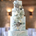 Close up of marble cake | Journey to the Centre of the Earth | modern ethereal winter styled bridal shoot by Hanami Dream | agate | marble | airplants | tulle | pale blue | gold | Oxleaze Barn | Gloucestershire | October 2017 | Photography by Squib Photography www.squibphotography.co.uk