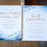 Blue watercolour stationery with gold calligraphy | Journey to the Centre of the Earth | modern ethereal winter styled bridal shoot by Hanami Dream | agate | marble | airplants | tulle | pale blue | gold | Oxleaze Barn | Gloucestershire | October 2017 | Photography by Squib Photography www.squibphotography.co.uk