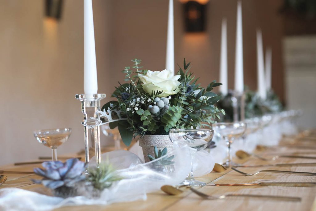 Table runner with candles and floral displays | Journey to the Centre of the Earth | modern ethereal winter styled bridal shoot by Hanami Dream | agate | marble | airplants | tulle | pale blue | gold | Oxleaze Barn | Gloucestershire | October 2017 | Photography by Squib Photography www.squibphotography.co.uk