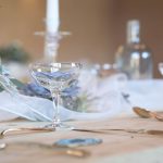 Champagne coupe glasses and gold cutlery | Journey to the Centre of the Earth | modern ethereal winter styled bridal shoot by Hanami Dream | agate | marble | airplants | tulle | pale blue | gold | Oxleaze Barn | Gloucestershire | October 2017 | Photography by Squib Photography www.squibphotography.co.uk