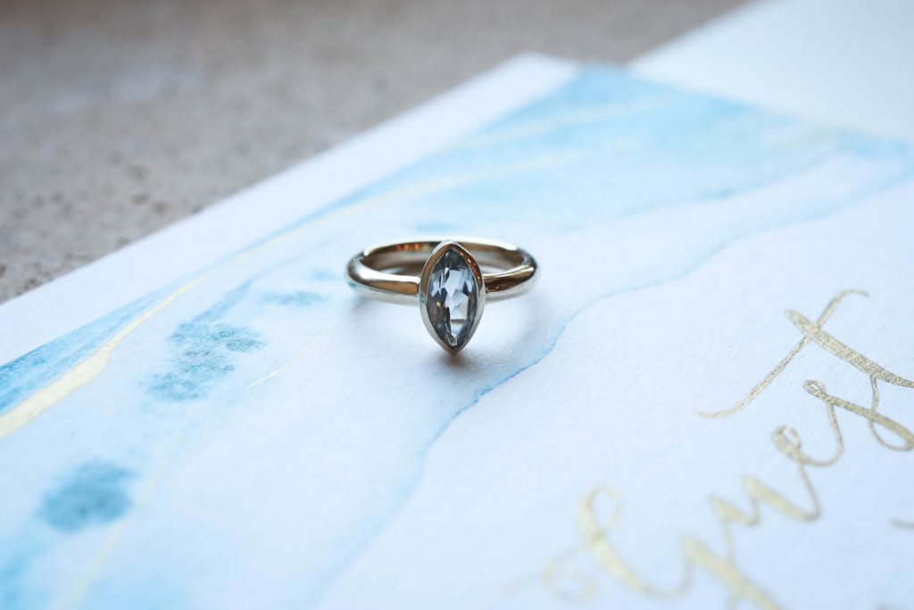 Blue engagement ring | Journey to the Centre of the Earth | modern ethereal winter styled bridal shoot by Hanami Dream | agate | marble | airplants | tulle | pale blue | gold | Oxleaze Barn | Gloucestershire | October 2017 | Photography by Squib Photography www.squibphotography.co.uk