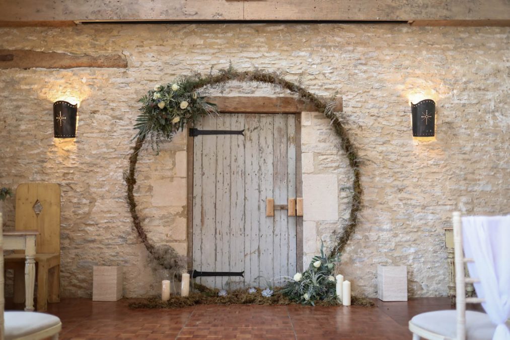 Moongate wreath circling the blue barn door | Journey to the Centre of the Earth | modern ethereal winter styled bridal shoot by Hanami Dream | agate | marble | airplants | tulle | pale blue | gold | Oxleaze Barn | Gloucestershire | October 2017 | Photography by Squib Photography www.squibphotography.co.uk