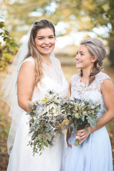 Bridal party laughing in garden | Journey to the Centre of the Earth | modern ethereal winter styled bridal shoot by Hanami Dream | agate | marble | airplants | tulle | pale blue | gold | Oxleaze Barn | Gloucestershire | October 2017 | Photography by Squib Photography www.squibphotography.co.uk