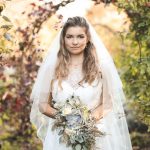 Close up of bride in the orchard | Journey to the Centre of the Earth | modern ethereal winter styled bridal shoot by Hanami Dream | agate | marble | airplants | tulle | pale blue | gold | Oxleaze Barn | Gloucestershire | October 2017 | Photography by Squib Photography www.squibphotography.co.uk