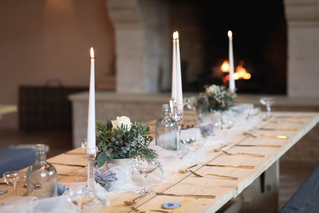Candles and firelight tablescape | Journey to the Centre of the Earth | modern ethereal winter styled bridal shoot by Hanami Dream | agate | marble | airplants | tulle | pale blue | gold | Oxleaze Barn | Gloucestershire | October 2017 | Photography by Squib Photography www.squibphotography.co.uk