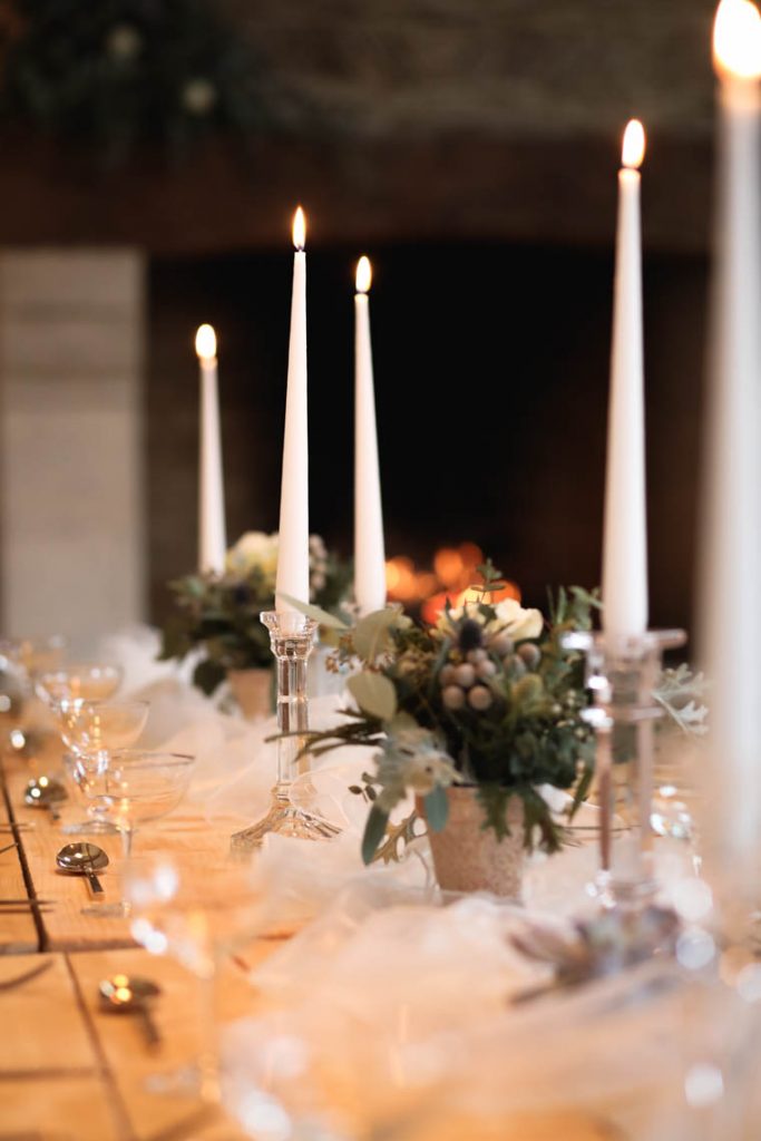 Close up of lit candles | Journey to the Centre of the Earth | modern ethereal winter styled bridal shoot by Hanami Dream | agate | marble | airplants | tulle | pale blue | gold | Oxleaze Barn | Gloucestershire | October 2017 | Photography by Squib Photography www.squibphotography.co.uk